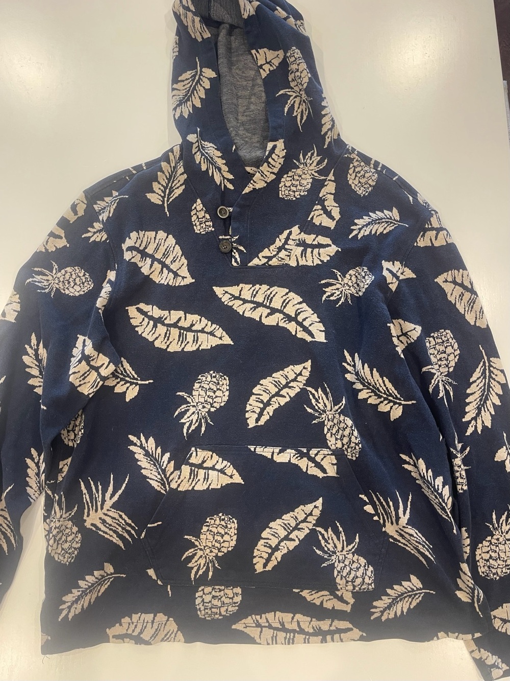on the byas Navy Hooded Pullover with Cream Pineapple Print